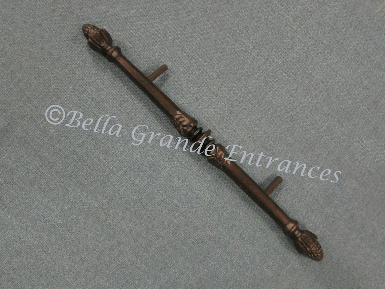 A Acorn Pull handle 45 degree rotate image on a grey cloth surface