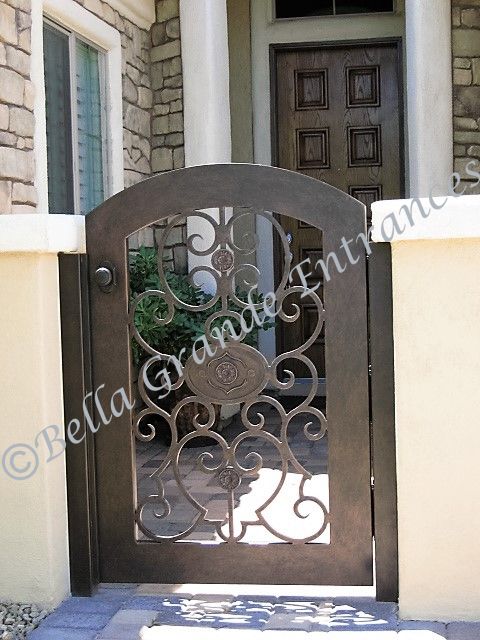 Luxurious Las Vegas building entrance with a small decorative iron gate.