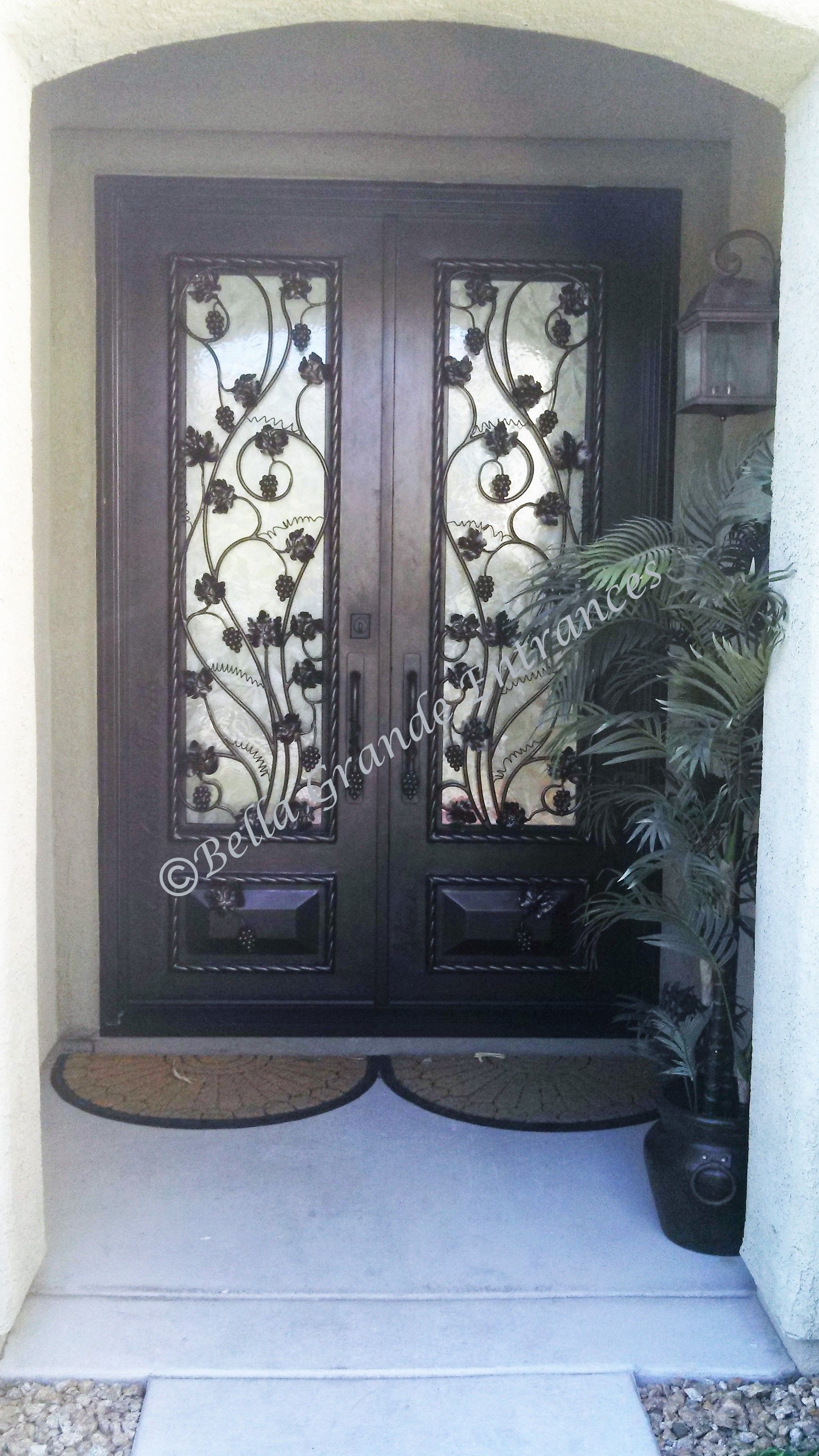Close-up of stunning, twisted iron door on house entrances in Las Vegas (manufactured by Bella Grande Entrances)