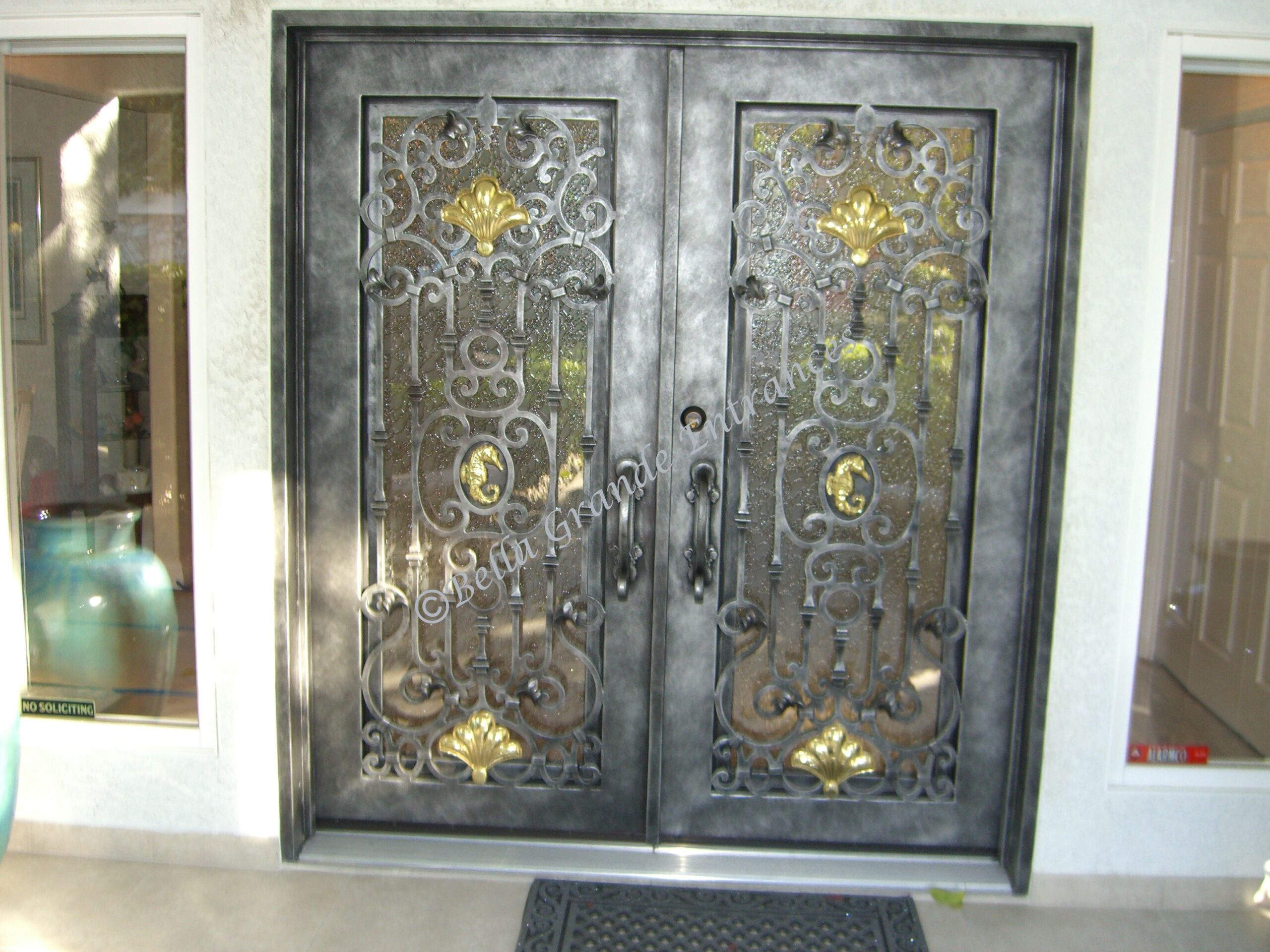Close-up of a beautifully crafted double iron door made by Bella Grande Entrances Las Vegas.