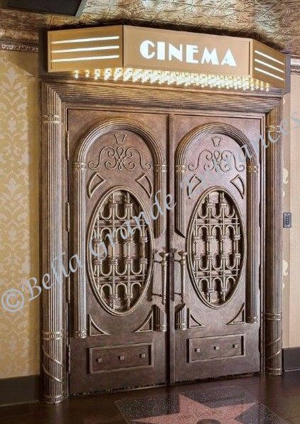 Luxurious double iron door at the entrance of a cinema hall, manufactured by Bella Grande Entrances Las Vegas.