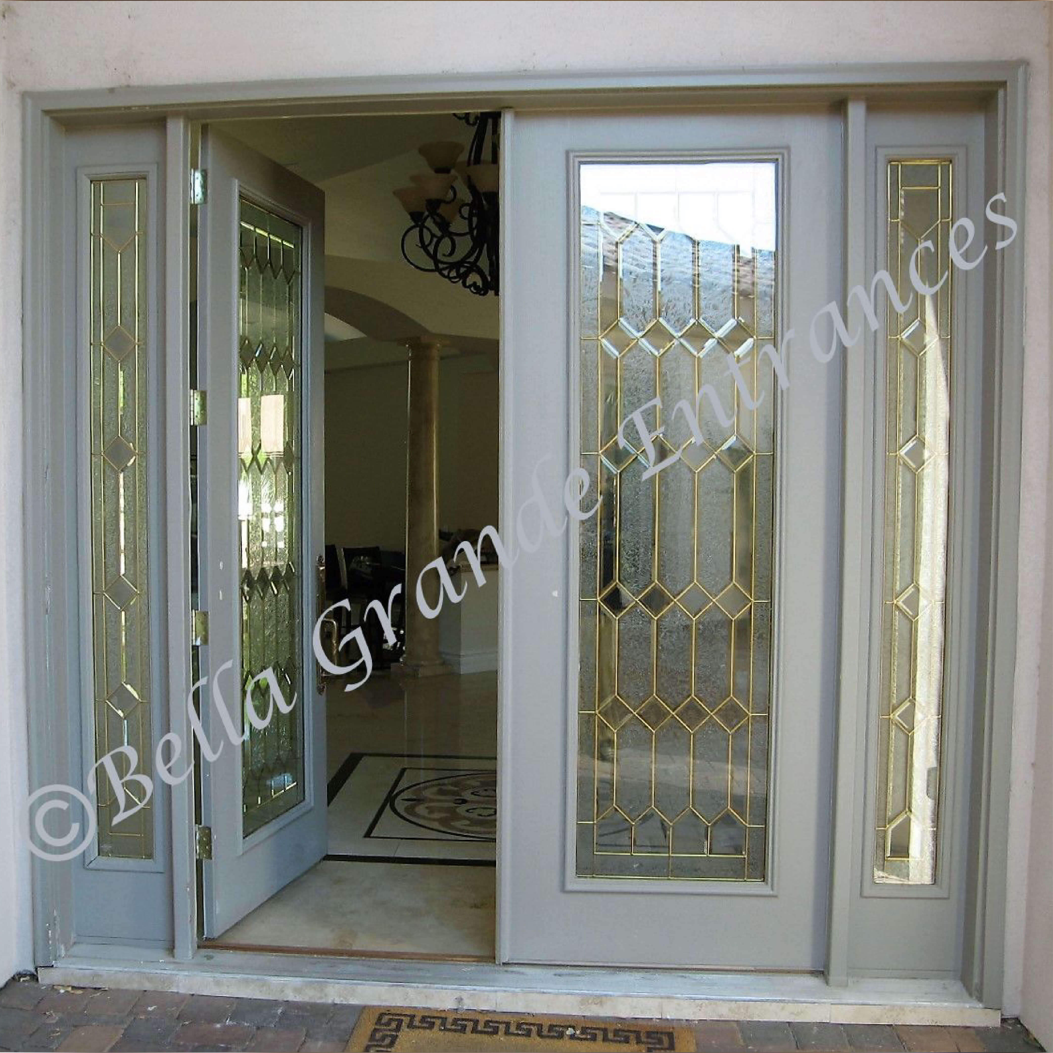 Before installing the Bella Grande Entrances Contemporary Iron Model-CT-12 door, there is a white wooden door in place.